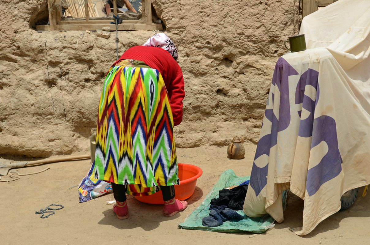 18 Woman Washing Clothes In Yilik Village On The Way To K2 China Trek
